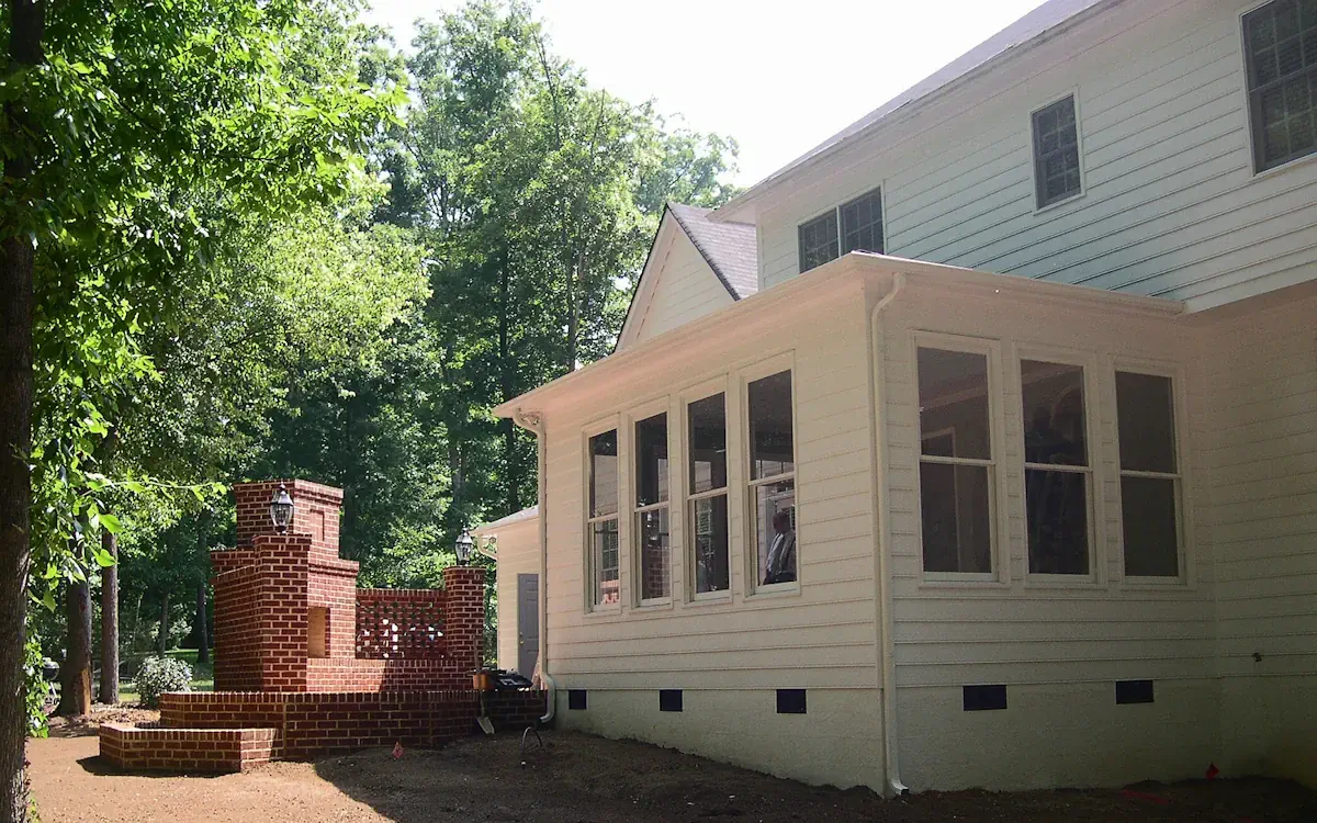 Sunroom Kitchen Extension with Brick Patio and Fireplace (Matthews)