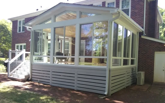 Heated / Cooled Four Season Sunroom (South Charlotte) Desk With Metal Balusters and Steps W/ Railings Mitsubishi Split Unit Heat Pump