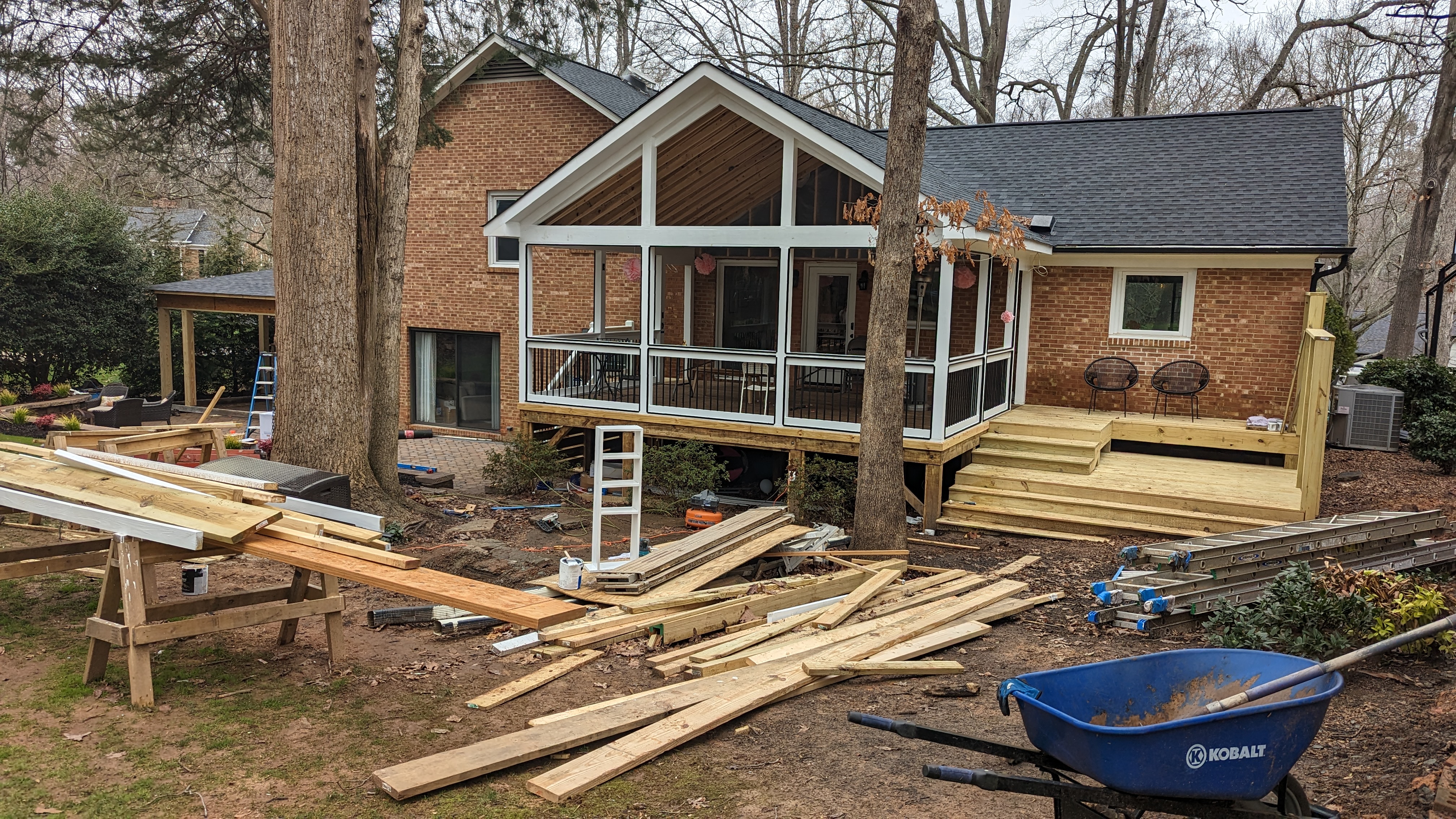 The porch and adjoining spa deck take shape with the privacy wall in place.